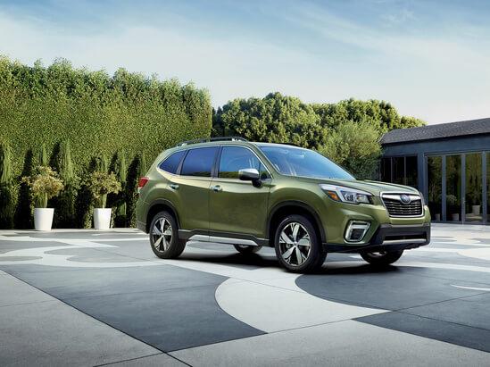 A green Subaru Forester